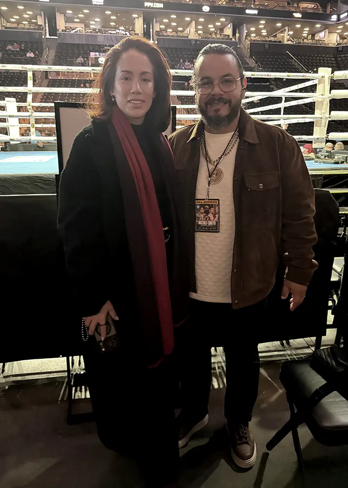 Backing champions. Faith in the ring with Nestor Bravo.