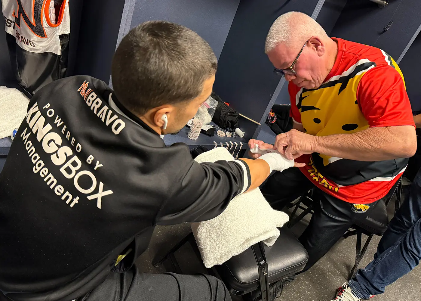 Backing champions. Faith in the ring with Nestor Bravo.