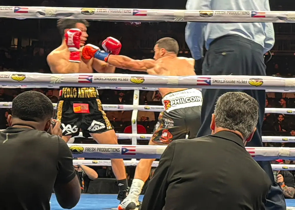 Backing champions. Faith in the ring with Nestor Bravo.